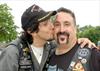  Rolling Thunder President, Mike Rock n Roll planting one on Mike Margiotta for luck.