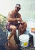  It was Chuck's job to shuck clams at our 4th of July Barbeques.  This was 1998 or 1999.
