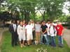  Old and new members of Delta Tau at memorial tree on 9-11-06.  Michael Margiotta 
( Chuck's God child) holding tree.  9-11-06