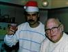  Here is a picture of Paul and my grandfather (Goody) on Xmas Eve.  They would alternate from year to year playing Santa Claus for the kids.